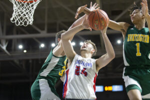 IN THE ZONE: No. 1 Morgantown spreads out No. 4 Huntington in second half, shuts down Highlanders in semifinals 64-42